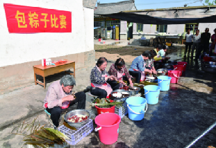 代县县委宣传部举办包粽子比赛
