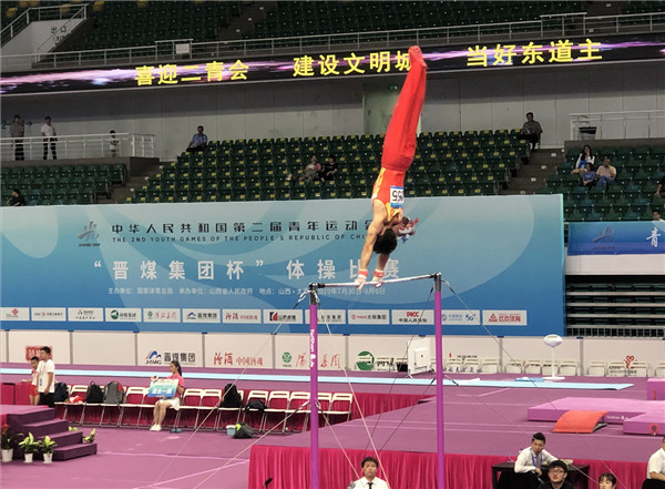 旋转、跳跃别眨眼 一起来看二青会体操比赛