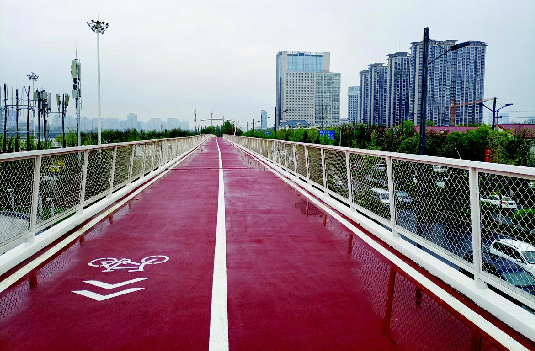 河畔“彩带”映春色 太原滨河自行车道5月将建成投用